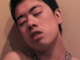 Cute Japanese guy gets naked on the beach japanese gay porn dvd